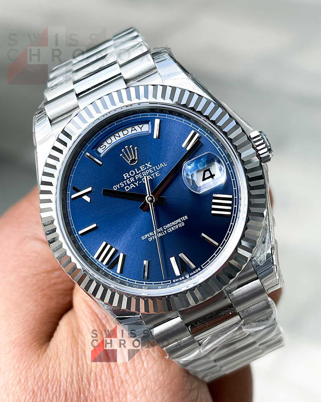 rolex day date 40 blue roman dial watch 228239