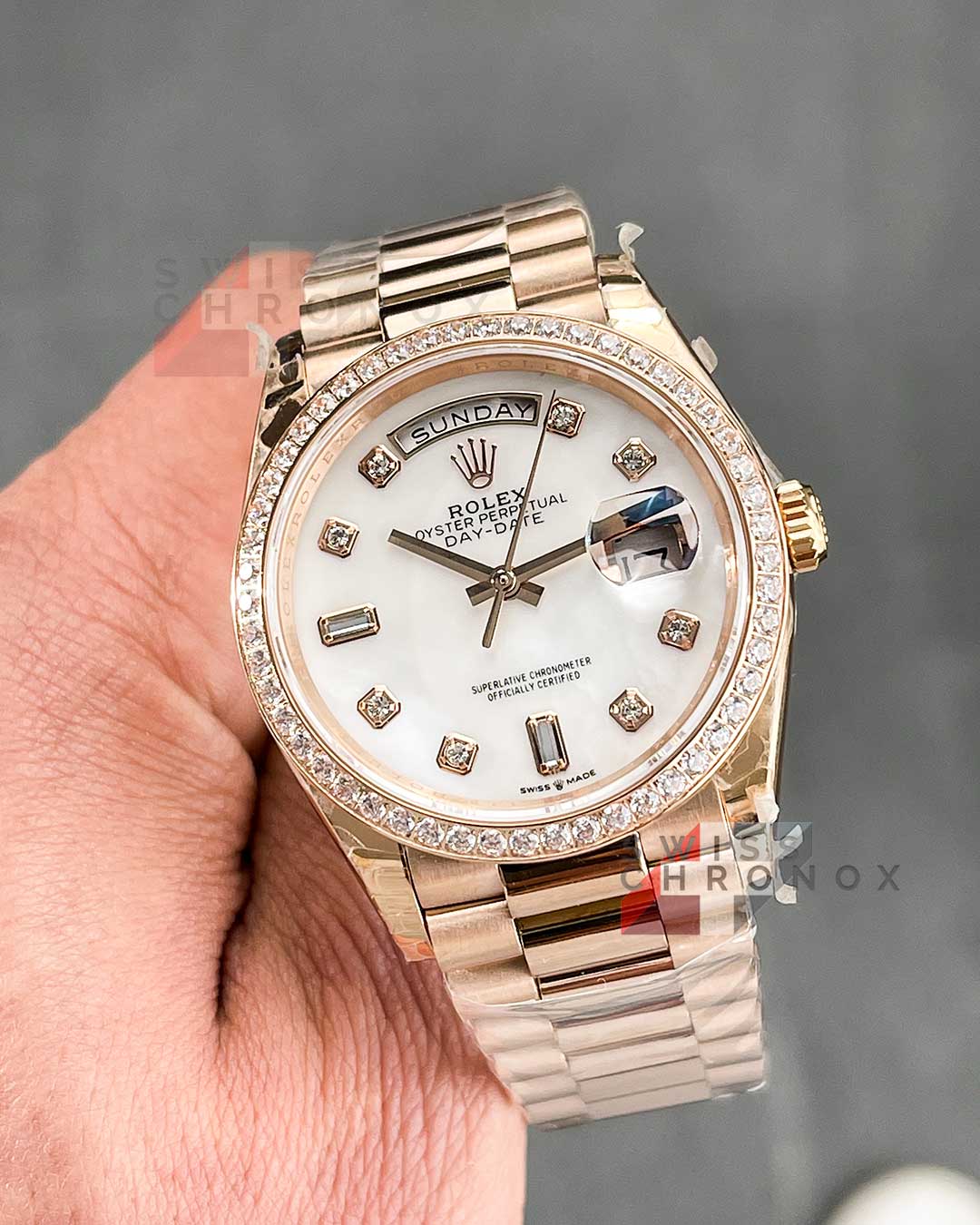 rolex day date 36 mother of pearl diamond rose gold 128235