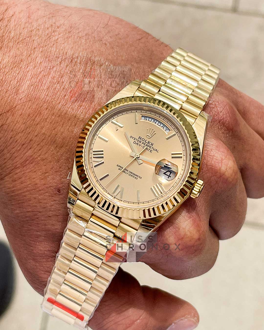 rolex 228238 day date 40 yellow gold champagne dial 3