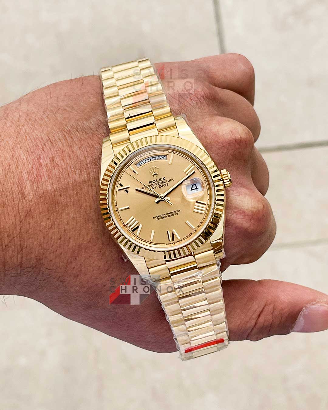 rolex 228238 day date 40 yellow gold champagne dial 6