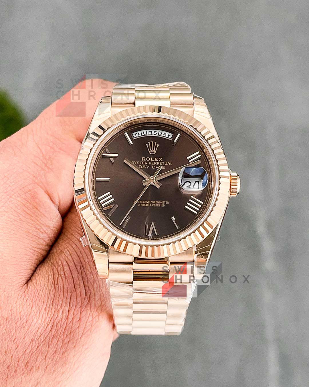 rolex day date 40 chocolate roman dial 1