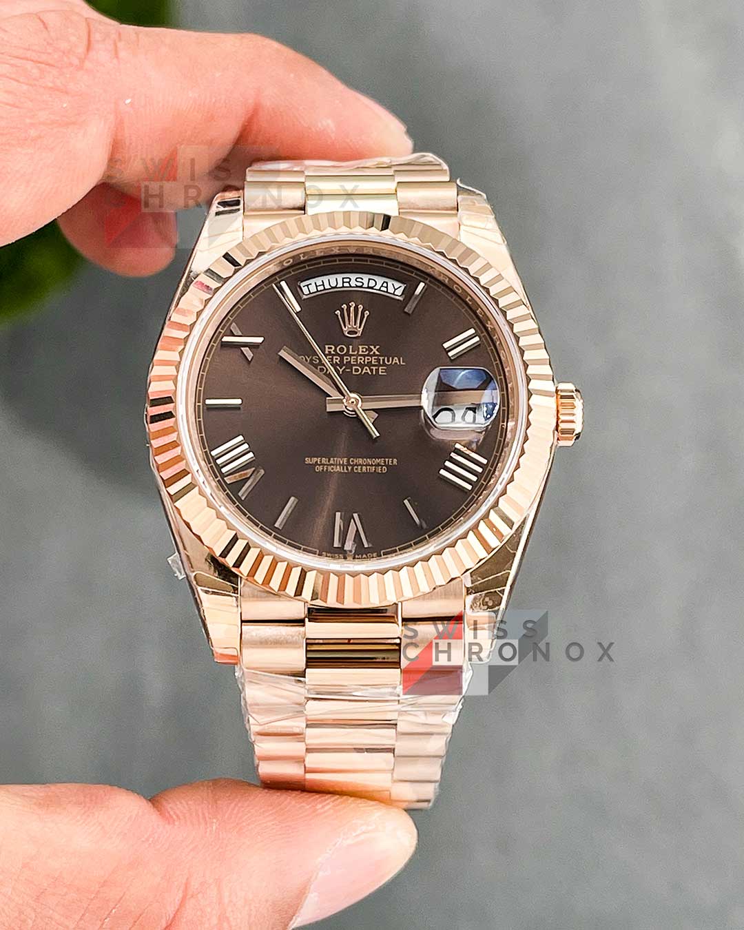 rolex day date 40 chocolate roman dial 6