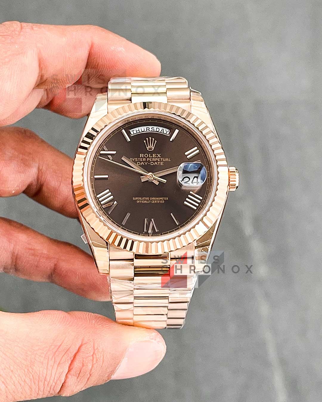 rolex day date 40 chocolate roman dial 8