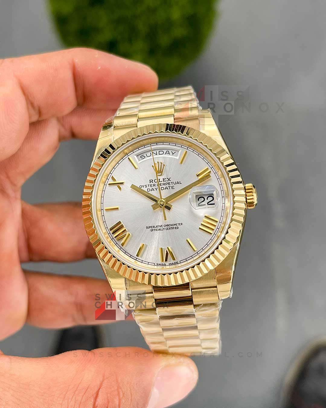 rolex day date 40 yellow gold silver dial 228238 1