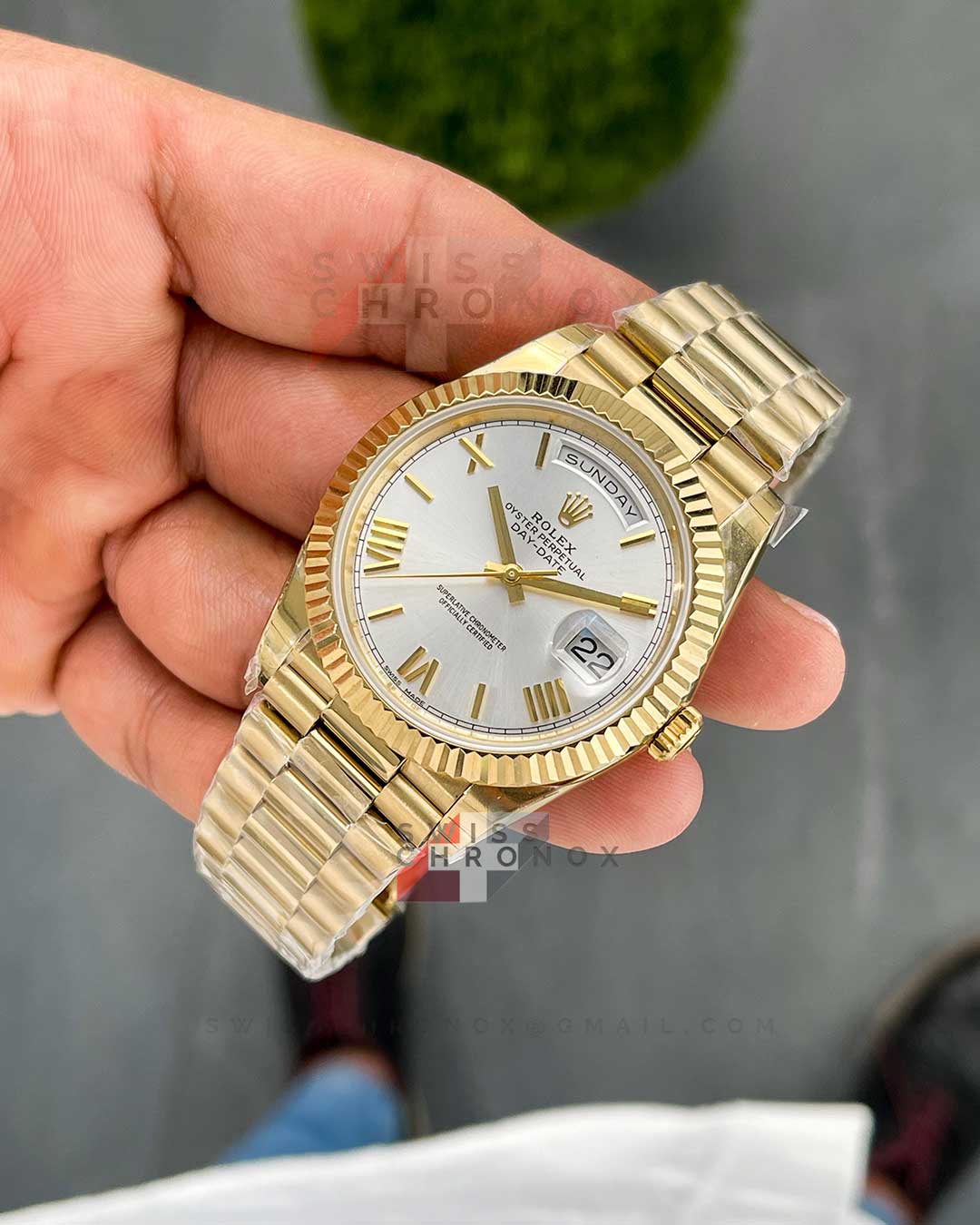 rolex day date 40 yellow gold silver dial 228238 10