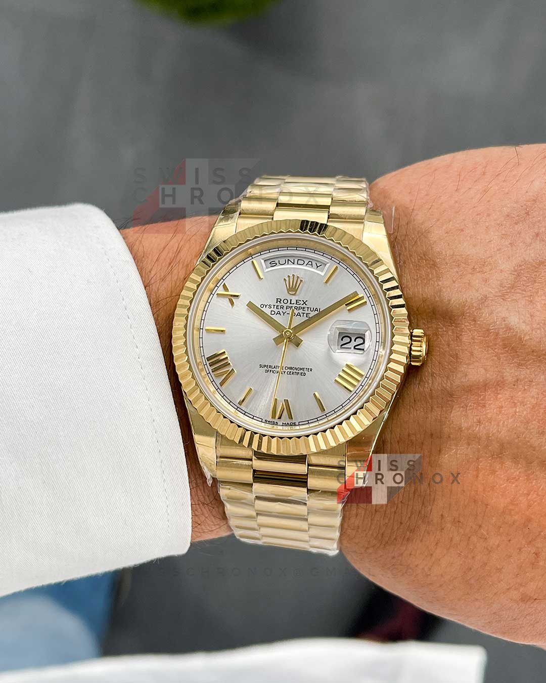 rolex day date 40 yellow gold silver dial 228238 11