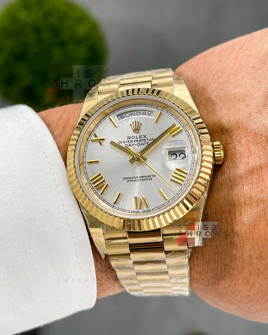 rolex day date 40 yellow gold silver dial 228238 12