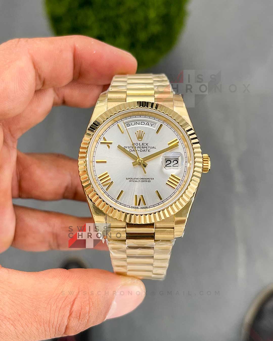 rolex day date 40 yellow gold silver dial 228238 2