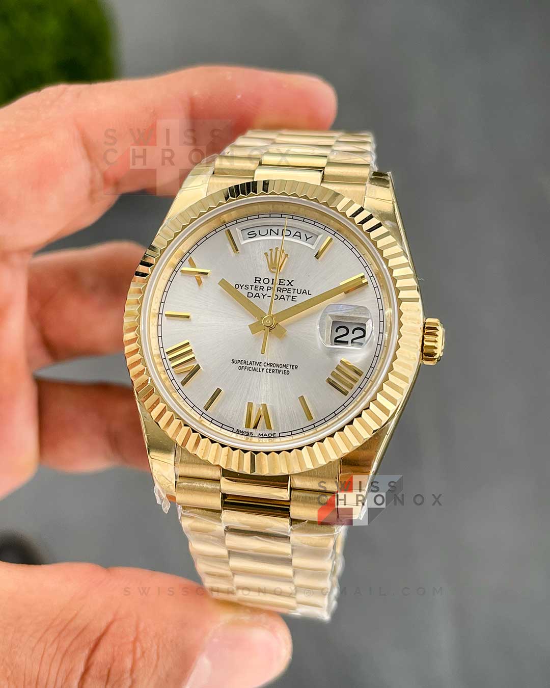rolex day date 40 yellow gold silver dial 228238 4