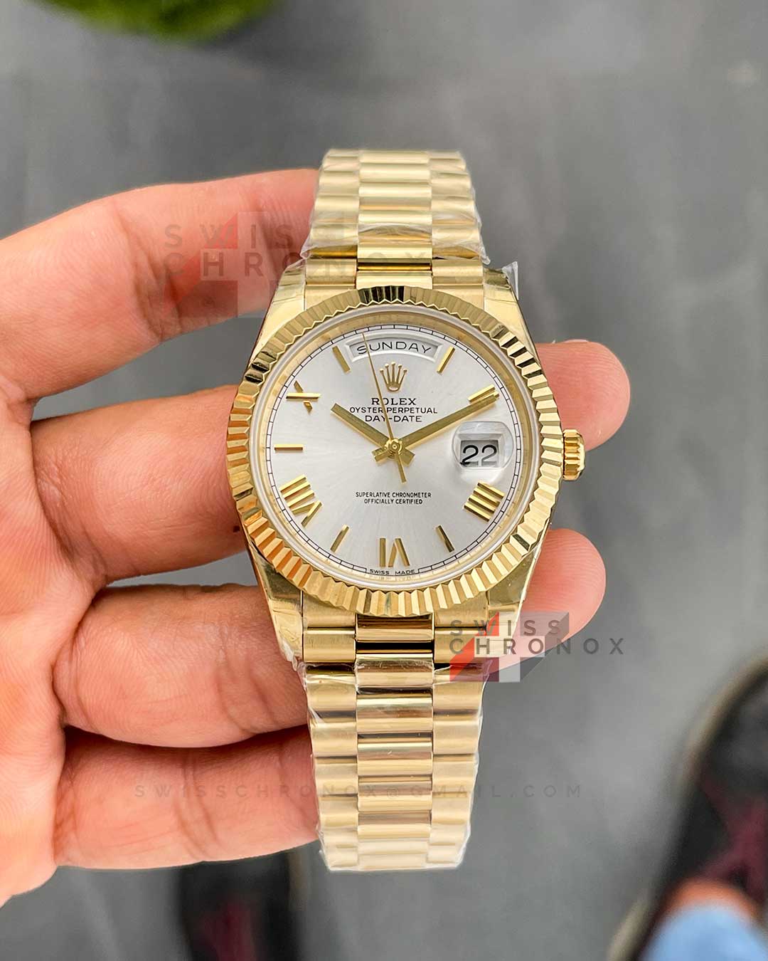 rolex day date 40 yellow gold silver dial 228238 9