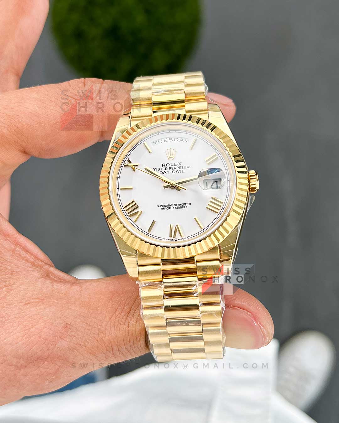rolex day date 40 yellow gold white roman dial 228238 5