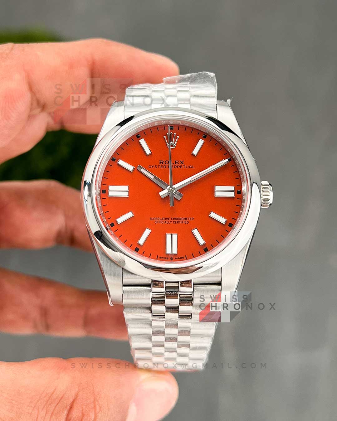 rolex perpetual 41 mm 124300 coral red jubilee 1