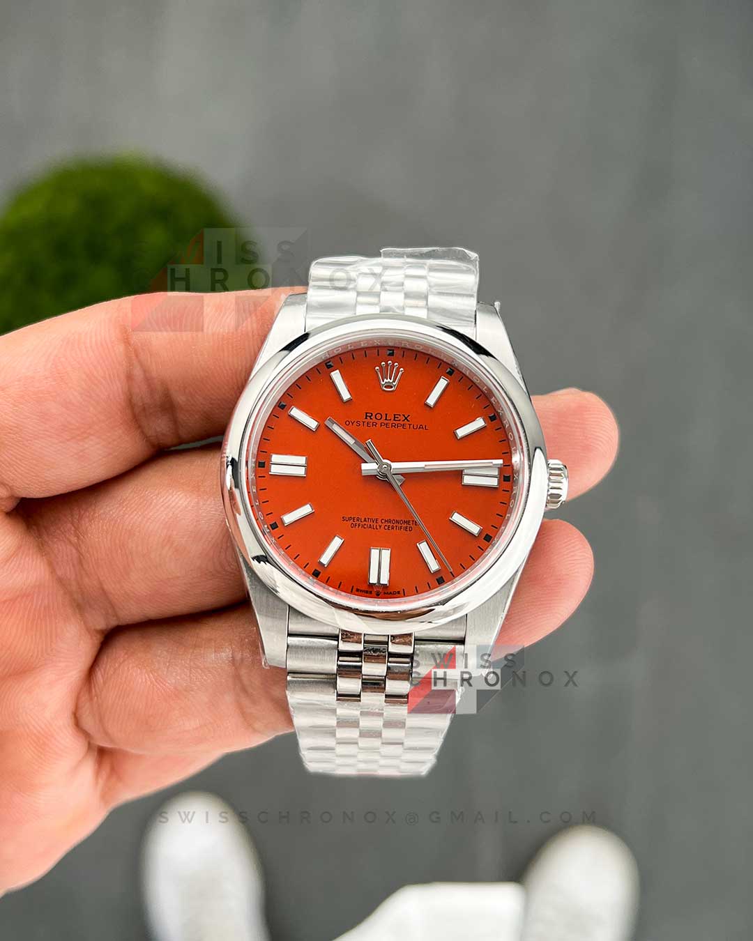 rolex perpetual 41 mm 124300 coral red jubilee 8