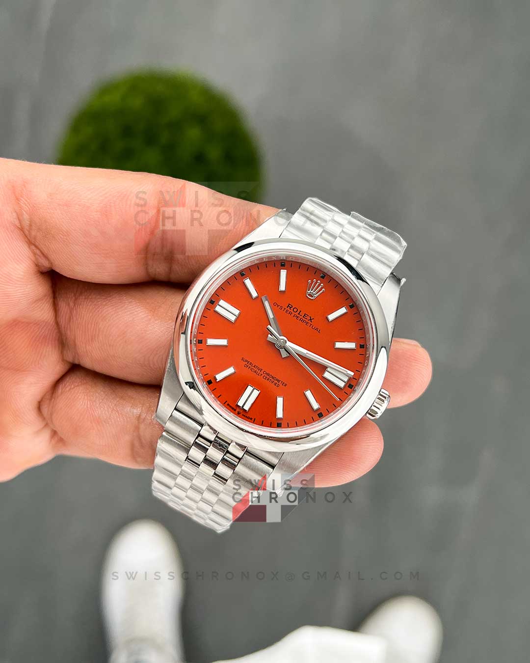 rolex perpetual 41 mm 124300 coral red jubilee 9
